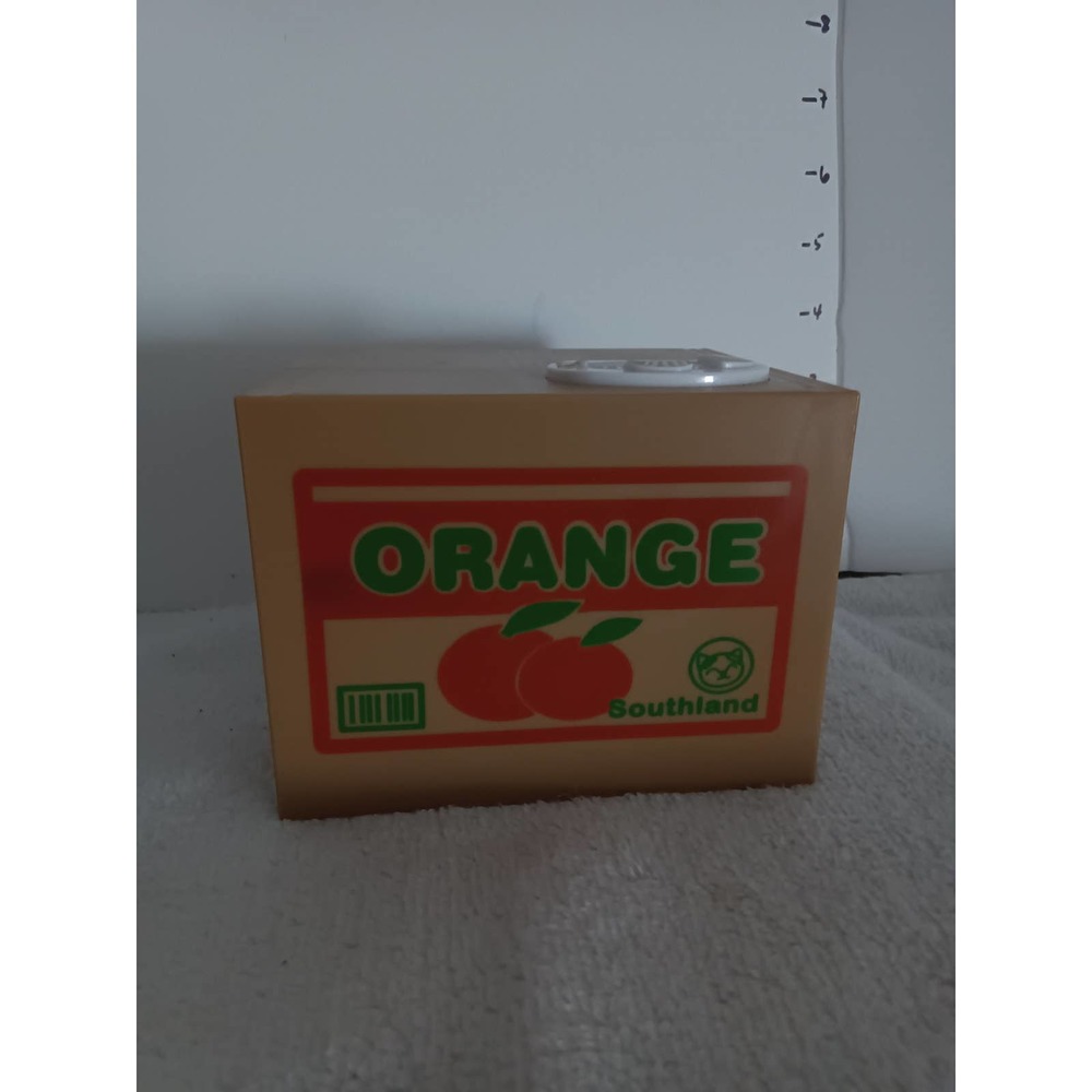 Electronic kitty coin bank in orange box